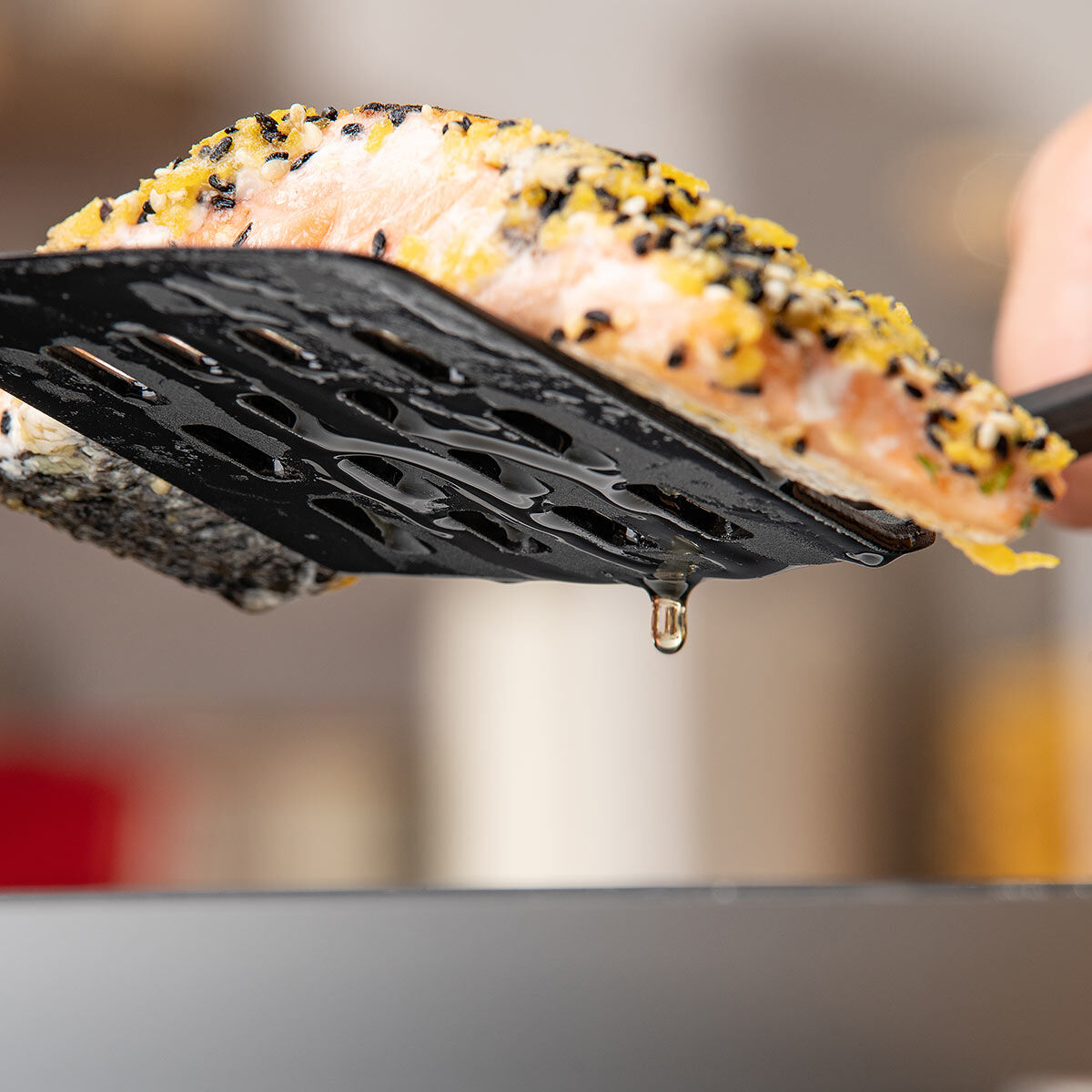 Pfannenwender mit Schlitzen Statement