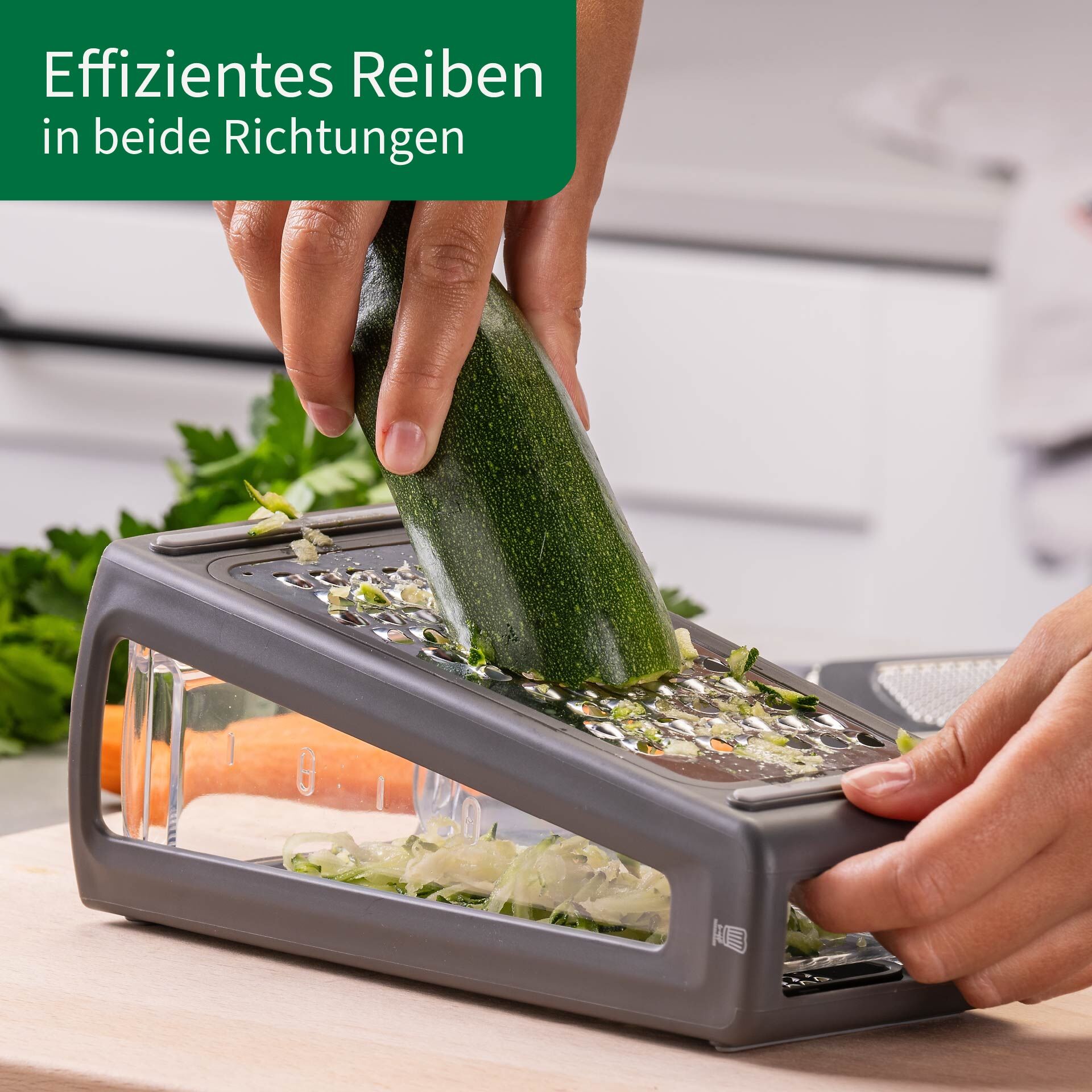 Küchenreibe mit Behälter