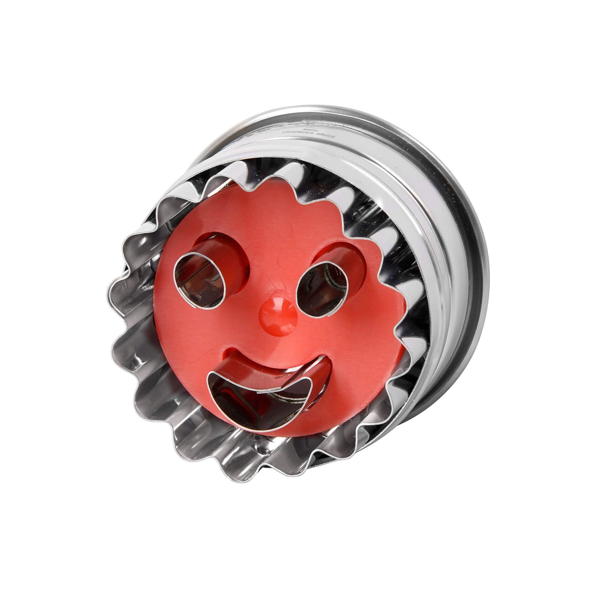Ausstecher Lachendes Gesicht, mechanisch
